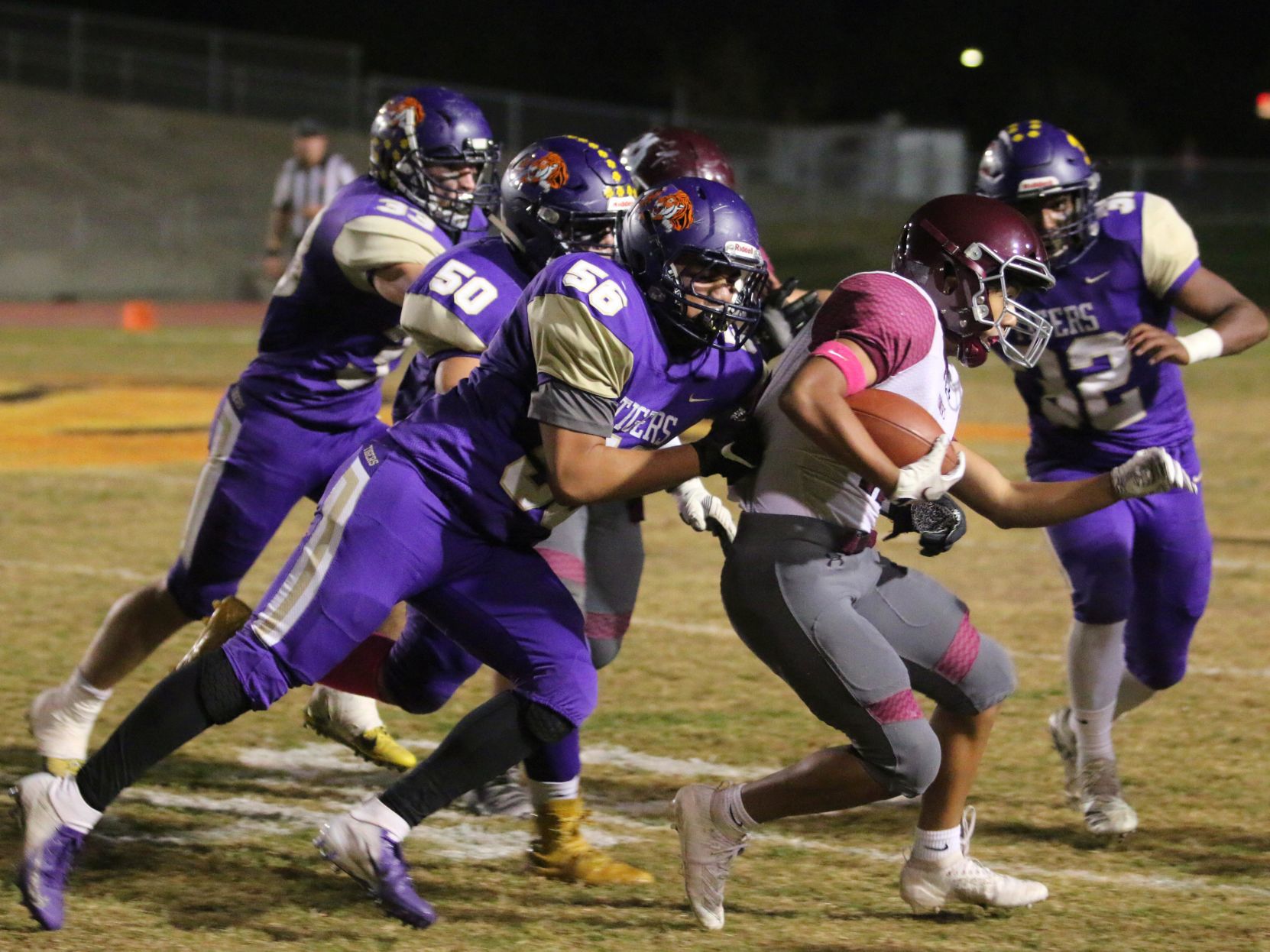 Tigers stay hot with 42-6 rout of Pioneers, clinch playoff spot